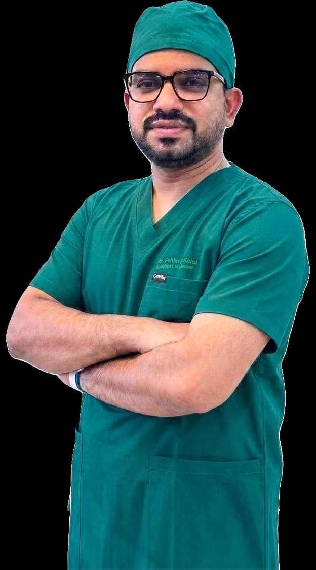 Dr. Fahim Foysal Kollol, surgeon, in green scrubs